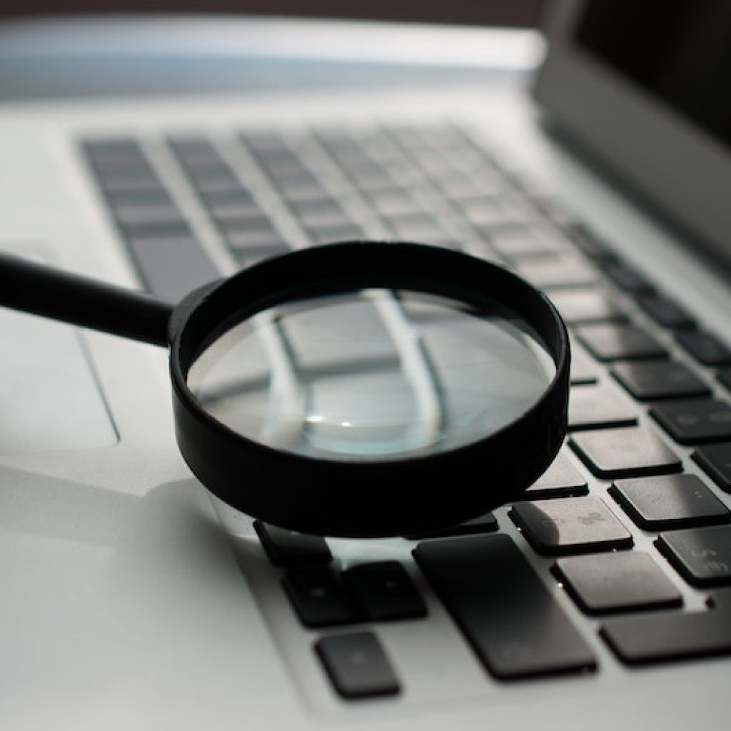 magnifying-glass-over-computer
