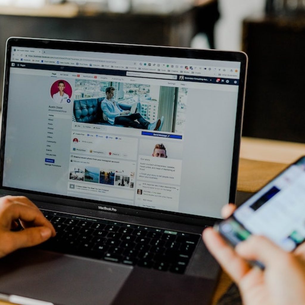 person-using-websites-on-desktop-and-mobile